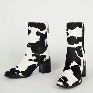 Intentionally Blank Cow Print Boots